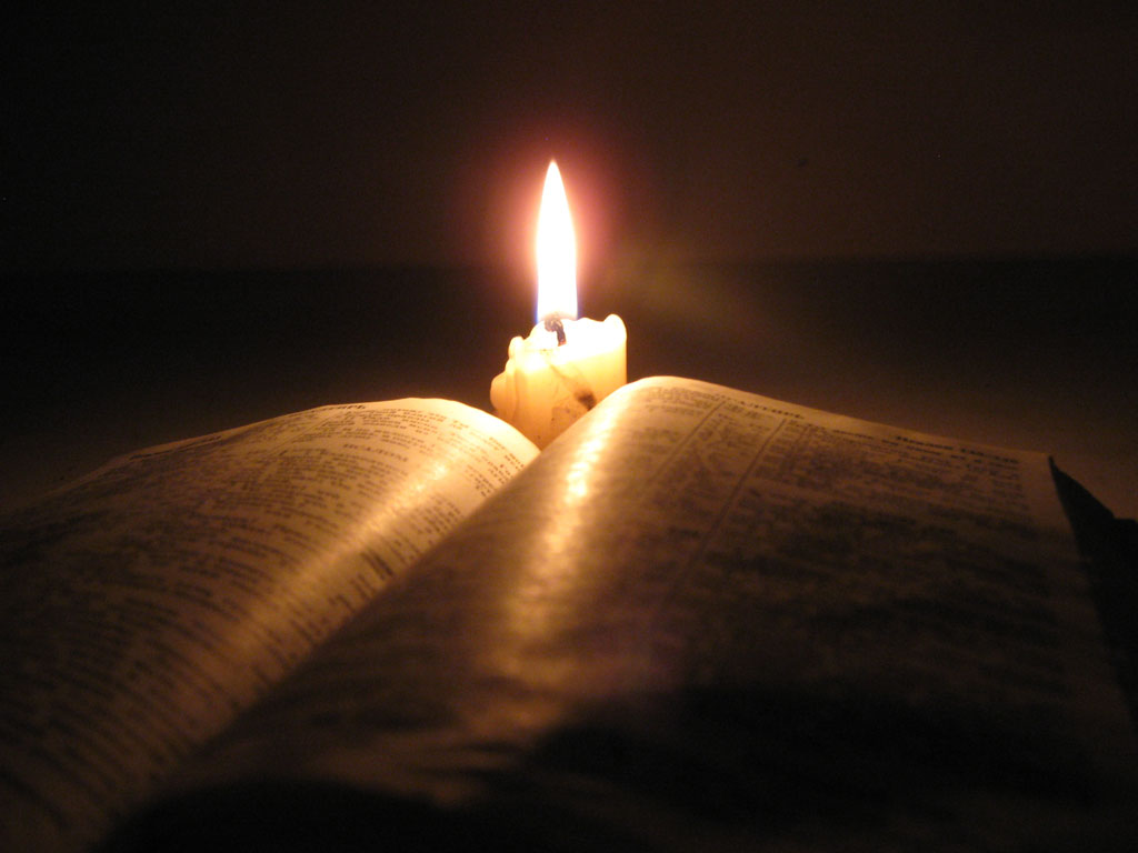 Open Bible With Candle