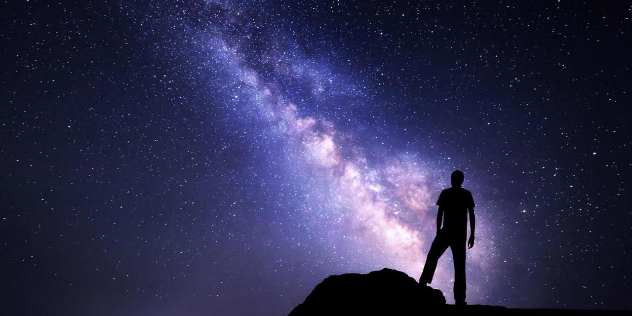 Man Looking At Universe